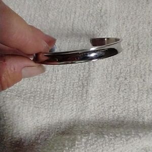 Silvertone my story isn't over yet cuff bracelet